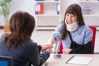 Women meeting with our New York pedestrian accident lawyers discussing an auto pedestrian accident settlement